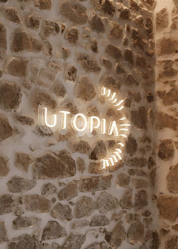 Utopia Cannes neon logo